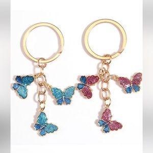 NIP BLUE OR PINK/BLUE BUTTERFLY BAG CHARM